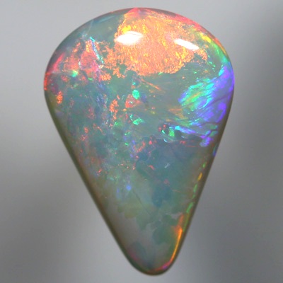 SOLID SEMI BLACK OPAL Crisp red and orange over green and blue